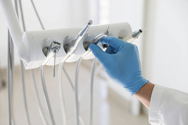 Professional Emergency Dentist technician working in Higginsville, MO